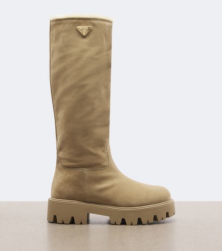 Prada Bottes en daim et shearling - Prada - Modalova