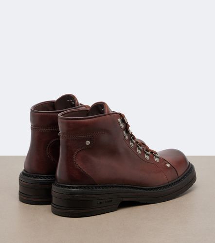 Miu Miu Bottes à lacets en cuir - Miu Miu - Modalova