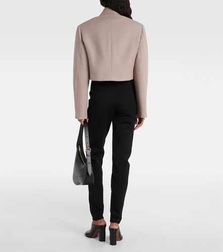 Alaïa Leggings taille haute en gabardine - Alaia - Modalova