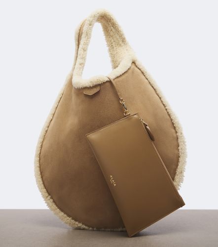 Alaïa Sac One Piece en daim et shearling - Alaia - Modalova