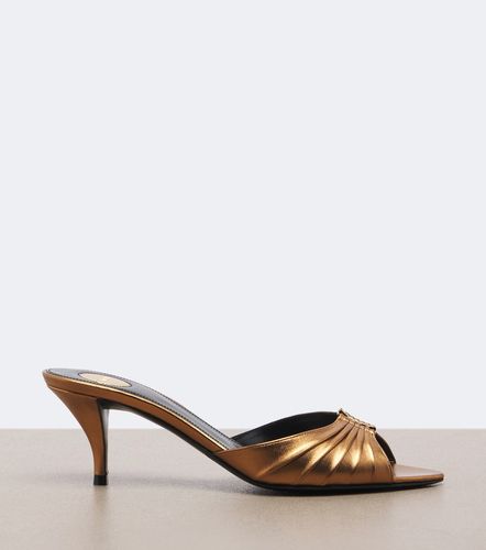 Mules Babylone Cassandre en cuir métallisé - Saint Laurent - Modalova