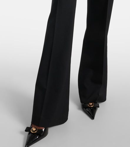 Pantalon évasé à taille haute en laine - Versace - Modalova