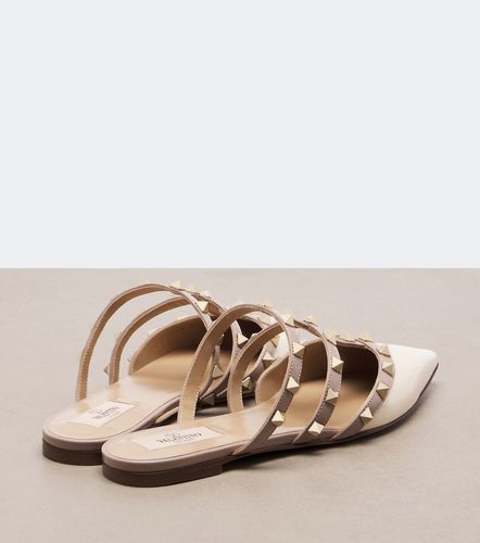 Mules Rockstud en cuir verni - Valentino Garavani - Modalova