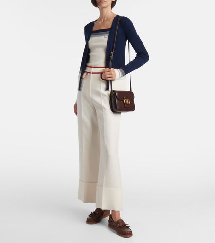 Cardigan rayé en laine vierge - Valentino Garavani - Modalova