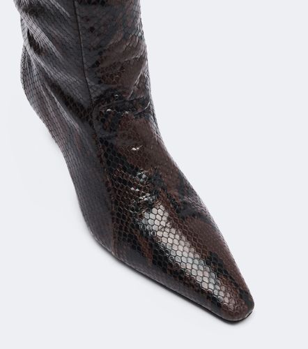 Bottines Cave en cuir façon serpent - JUDE - Modalova