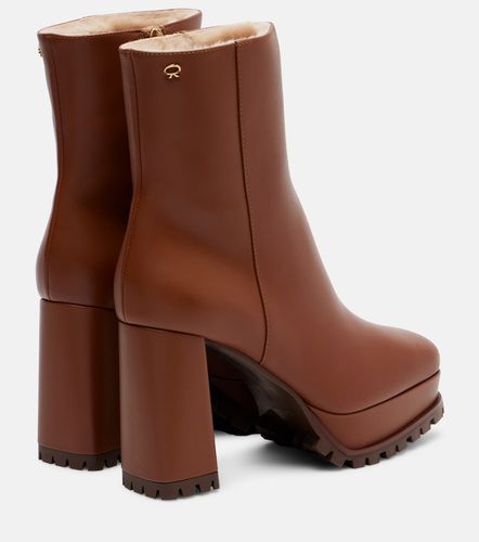 Bottines à plateau en cuir et shearling - Gianvito Rossi - Modalova