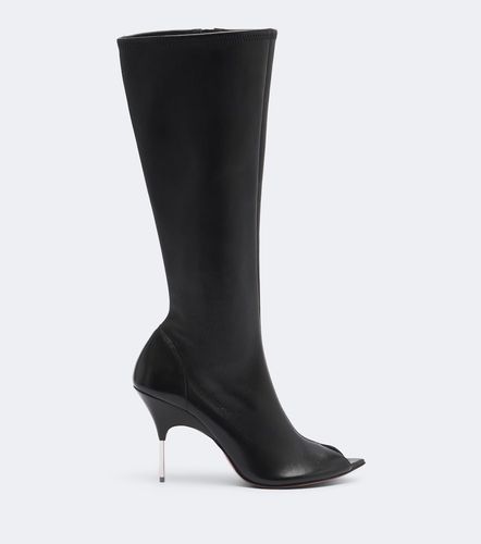 Amina Muaddi Bottes Bruna en cuir - Amina Muaddi - Modalova