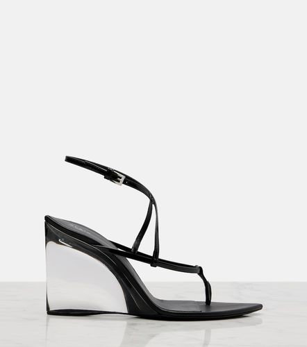 Alaïa Sandales compensées en cuir verni - Alaia - Modalova
