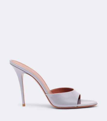 Mules Elodie en cuir verni - Amina Muaddi - Modalova