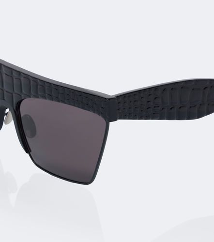 Alaïa Lunettes de soleil à effet croco - Alaia - Modalova