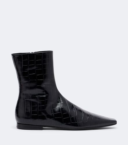 Bottines en cuir façon croco - Toteme - Modalova