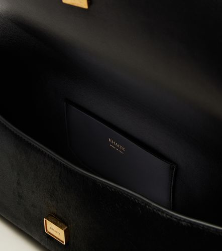 Pochette Audrey Medium en cuir façon poulain - Khaite - Modalova