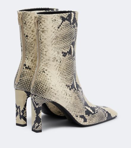 Bottines en cuir façon serpent - Toteme - Modalova