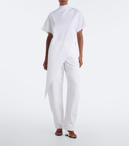 Alaïa T-shirt asymétrique en coton - Alaia - Modalova