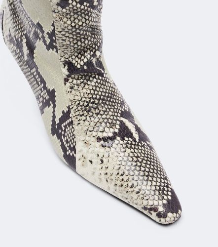 Bottines Cave en cuir façon serpent - JUDE - Modalova