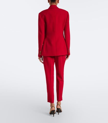 Pantalon ajusté en laine vierge - Versace - Modalova