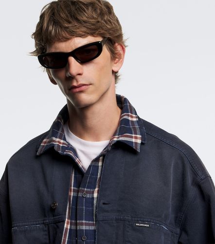 Lunettes de soleil ovales à logo - Balenciaga - Modalova