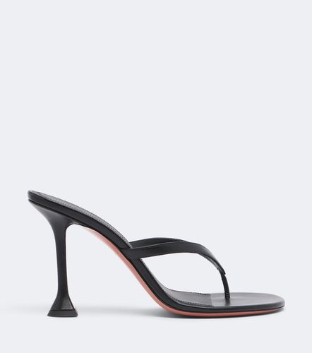 Amina Muaddi Mules Juliette en cuir - Amina Muaddi - Modalova