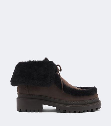 Bottines en daim et shearling - Yves Salomon - Modalova