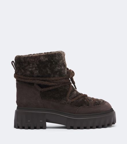 Bottines H700 en shearling à plateforme - Hogan - Modalova