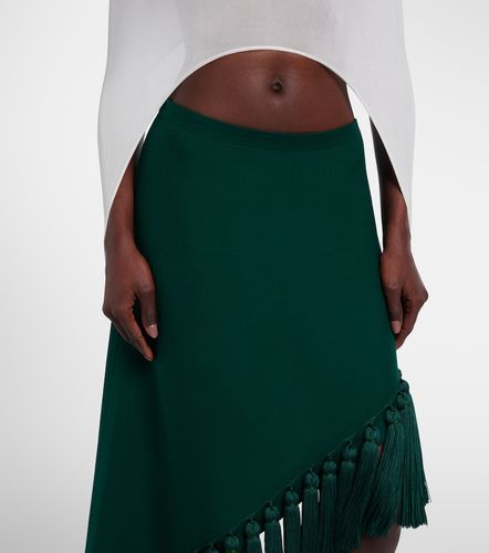Alaïa Jupe midi en gabardine de laine vierge - Alaia - Modalova