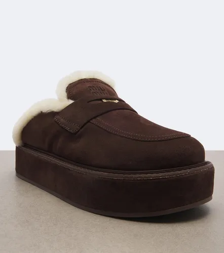 Miu Miu Mules compensées en daim - Miu Miu - Modalova