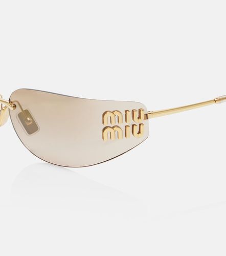 Lunettes de soleil ovales à logo - Miu Miu - Modalova