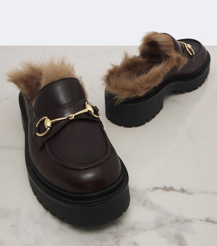 Mules Rhody à plateau en cuir et shearling - Gucci - Modalova