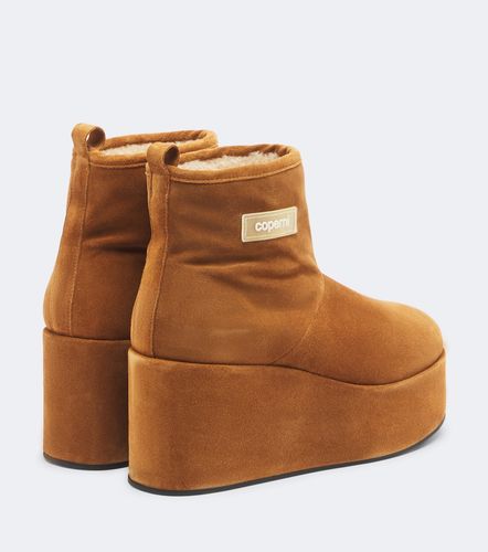 Bottines compensées en daim et shearling - Coperni - Modalova