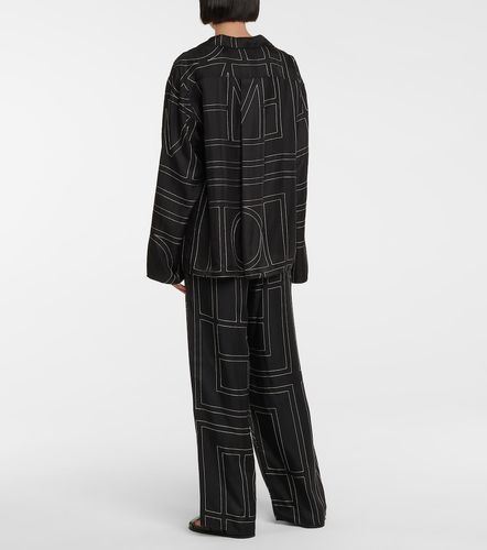 Chemise brodée en soie à logo - Toteme - Modalova