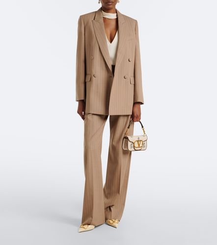 Pantalon ample en laine à rayures - Valentino Garavani - Modalova