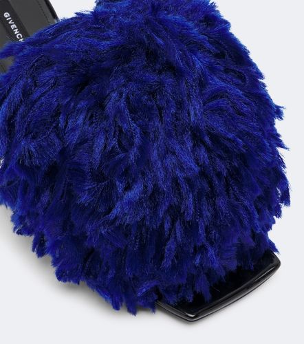Mules en cuir verni à pompons - Givenchy - Modalova