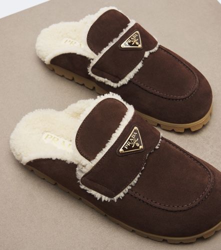 Prada Mules en daim et shearling - Prada - Modalova