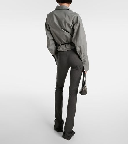 Pantalon évasé en jersey à découpes - The Attico - Modalova