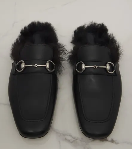 Mules Larindo en cuir et shearling - Gucci - Modalova