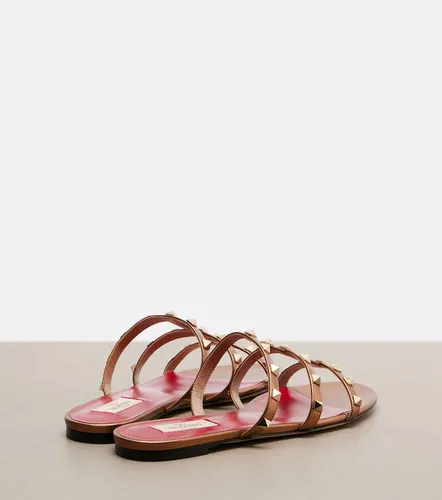 Mules Rockstud en cuir métallisé - Valentino Garavani - Modalova