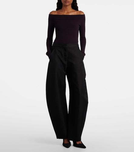Alaïa Pantalon ample en laine et soie - Alaia - Modalova