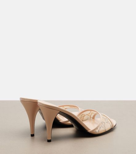 Mules Erin GG en cuir à ornements - Gucci - Modalova