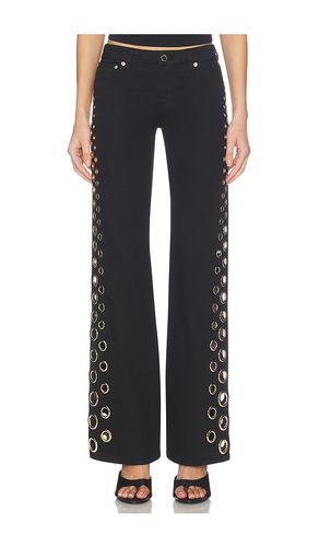 JEAN DROIT FLARE TAILLE BASSE AVEC ŒILLETS ROXIE en . Taille 25. Also en 27 - Alice + Olivia - Modalova