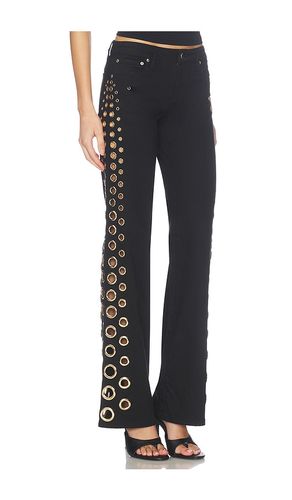 JEAN DROIT FLARE TAILLE BASSE AVEC ŒILLETS ROXIE en . Taille 24. Also en 28 - Alice + Olivia - Modalova