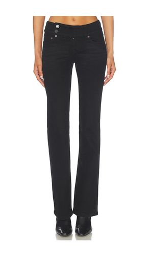 Malia Low Rise Belted Flare Denim Jeans en . Taille 27. Also en 28, 29, 30 - GUIZIO - Modalova