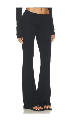 PANTALON ÉVASÉ À REVERS en . Taille L. Also en - Eterne - Modalova