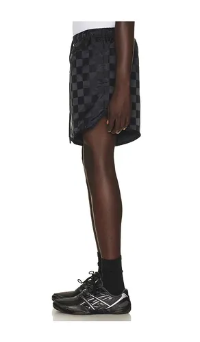 SHORT CHECKERED en . Taille XS. Also en S, M, L, XL/1X, XXL/2X - Fear of God ESSENTIALS - Modalova