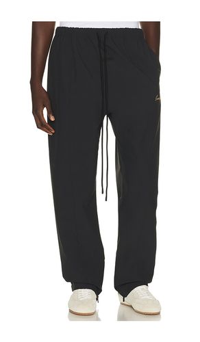 PANTALON DE SURVÊTEMENT SIGNATURE en . Taille L. Also en S, XL/1X, XXXL/3X - Fear of God ESSENTIALS - Modalova
