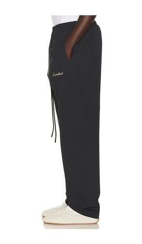 PANTALON DE SURVÊTEMENT SIGNATURE en . Taille L. Also en S, XXXL/3X - Fear of God ESSENTIALS - Modalova