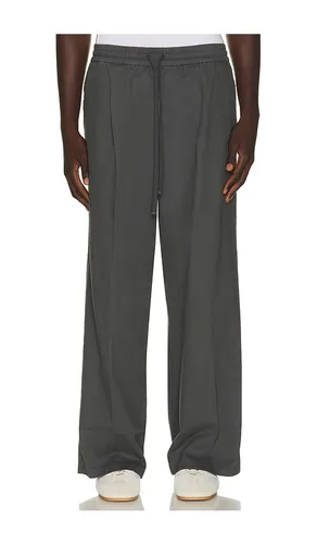 PANTALON PLEAT en . Taille L. Also en M, S - Fear of God ESSENTIALS - Modalova