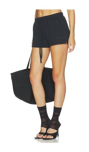 Running Short en . Taille M. Also en S, XS - Fear of God ESSENTIALS - Modalova