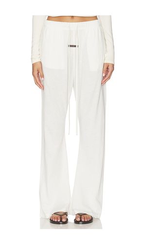 PANTALON FLARE en . Taille XS. Also en M, L - Fear of God ESSENTIALS - Modalova