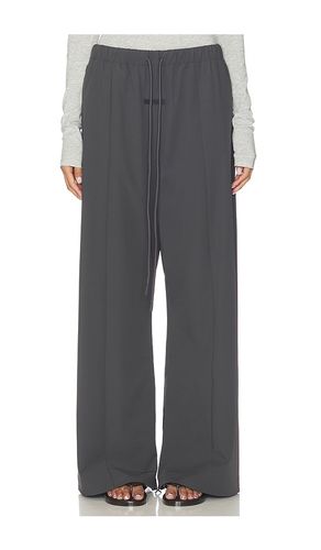PANTALON FORME JOGGING en . Taille S. Also en XS, L, XL - Fear of God ESSENTIALS - Modalova