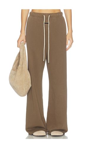 PANTALON SWEAT UNDONE CUT LOUNGE FIT en . Taille XS. Also en S, M - Fear of God ESSENTIALS - Modalova